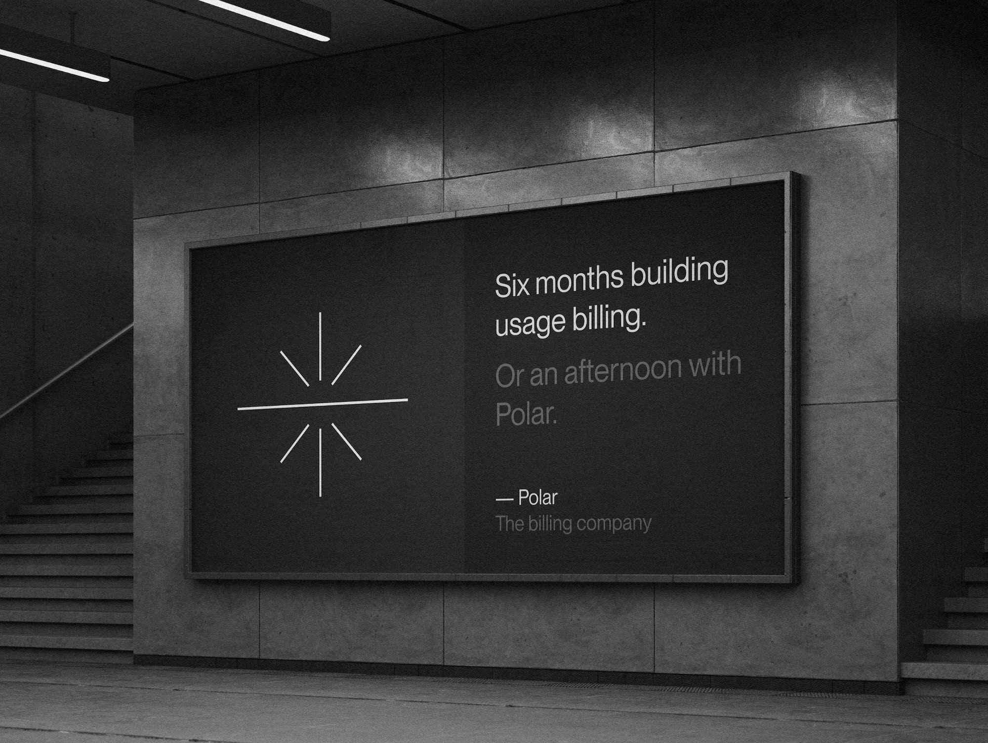 A Polar billboard in a concrete underpass that reads: Six months building usage billing. Or an afternoon with Polar.